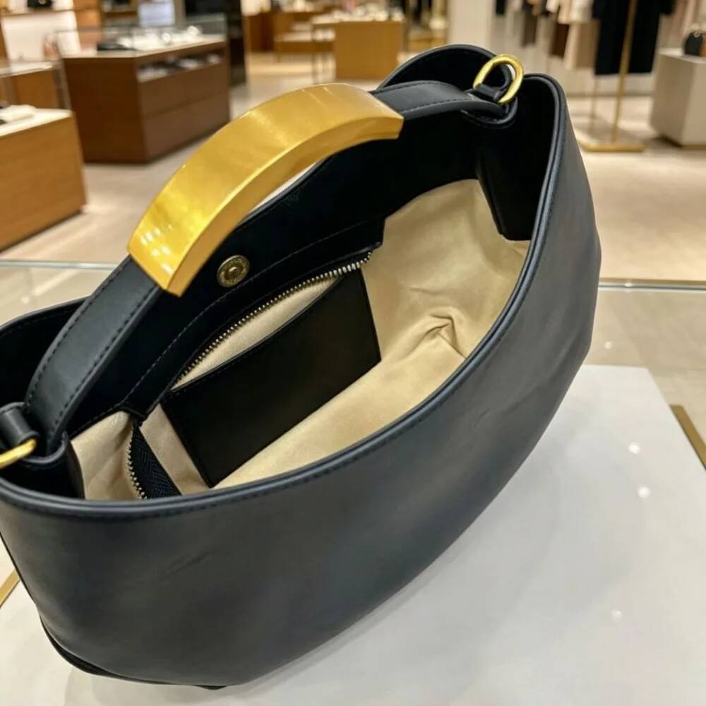 Halvemaanvormige dames handtas - Women Bags Golden recensie en prijs